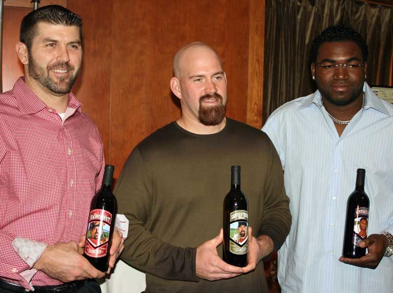 Jason Varitek, Kevin Youkilis and David Ortiz of the Boston Red Sox with Charity Wines