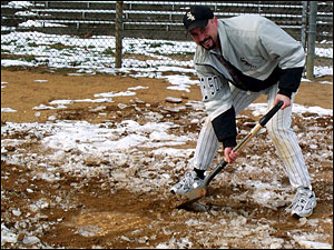 Murray Reed shovels out home plate