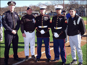 Boston Police Chief Kelley McCormick, John "Smokey" Moore, Toys for Tots representatives from the U.S. Marine Corps and Brett Rudy.