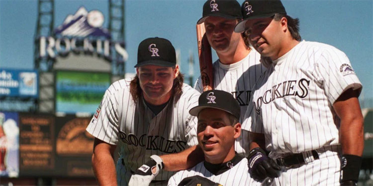 Colorado Rockies - Dante Bichette signs reunion jerseys.