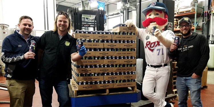 Chisel, the Rox Mascot with Rox Lager Beer