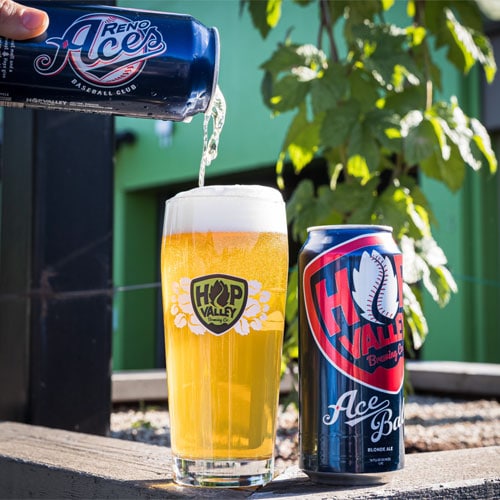 Pouring AceBall Blonde Ale from the Reno Aces