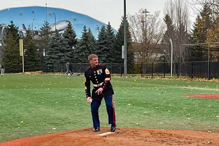 Gunnery Sergeant Neil Anderson Throws Out Winterball 2022 Ceremonial First Pitch