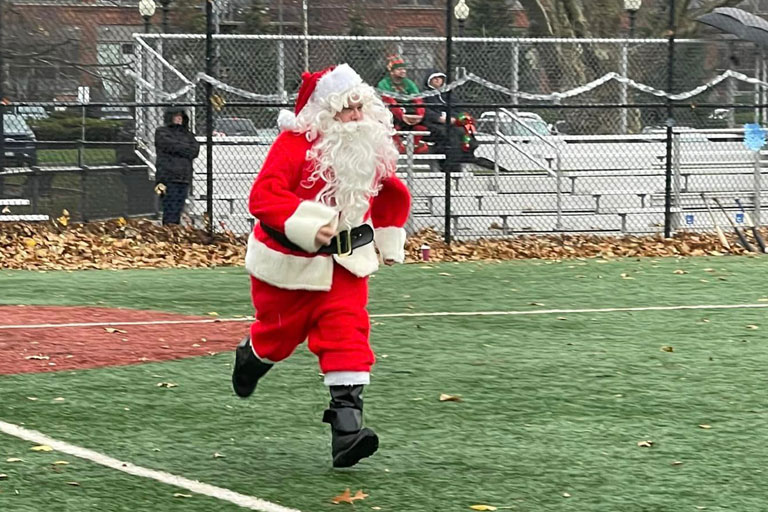 Santa Runs Out a Grounder