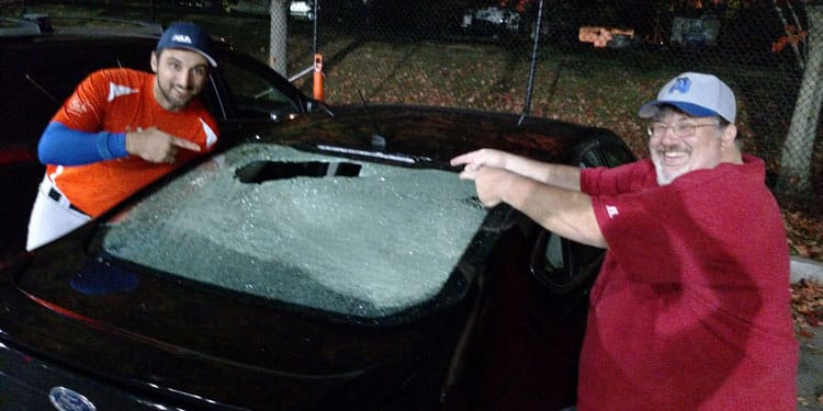 Baseball breaks car windshield glass, again