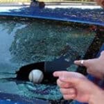 Baseball breaks car windshield glass - header