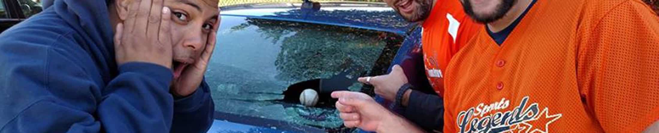 Baseball breaks car windshield glass - header