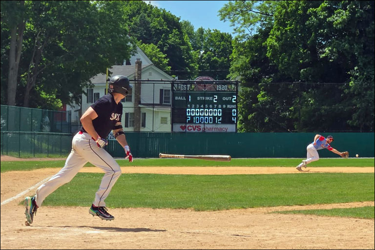 Jon Tasman of the Ben's Dream White Sox Finds a Hole at Doubleday Field