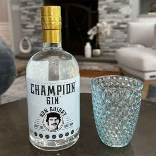 Championz Gin on the table, with Ron Guidry