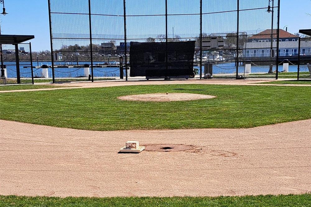 Savin Hill By The Sea.....put my first mat drag on it today....need a smaller drag.....but it still came out good....still waiting on that extra dirt as well.....coming along....will need the water hookup behind t he mound turned on in 2 days so that the infield can be watered to restore soil stability as part of the maintenance process....maintaining the base basket areas is a daily challenge.